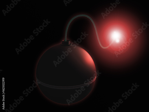 A round bomb with a burning fuse isolated on a black background