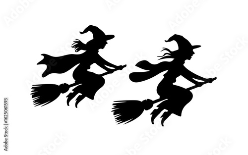 Witches flying on brooms Halloween night silhouette