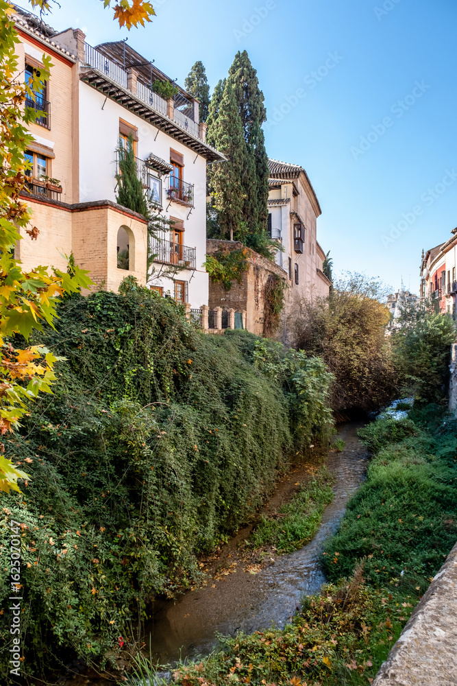 Fototapeta premium Granada. Traditional Moorish Spanish architecture around Darro River, Granada, Spain