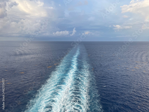 The wake left in the ocean behind a large shp