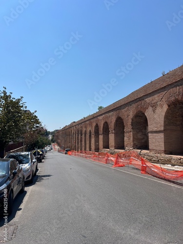 Ancient Roman Aqueduct in the heart of Rome, Italy. Construction work