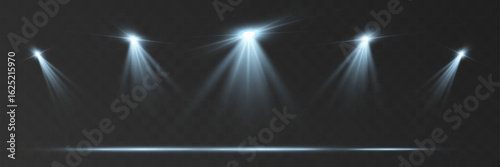 Empty spotlight stage with dark gradient background and bright beams of light illuminating the center. Suitable for presentations, performances, or dramatic effects.	