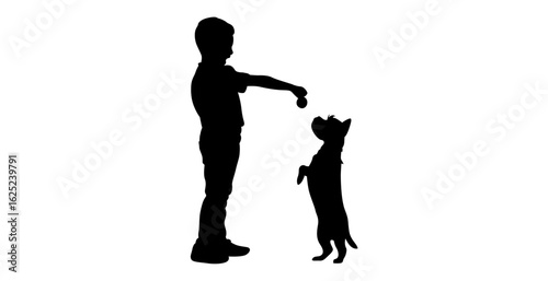 A simple silhouette of a boy and a dog playing, likely training or rewarding the dog.