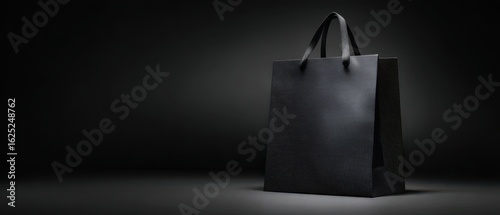 The Elegant Black Shopping Bag Against a Dark Background