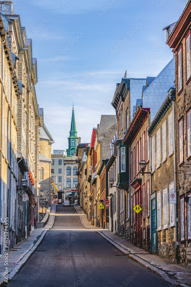 Fototapeta premium Historic streets and buildings in Old Quebec City under bright sunligh