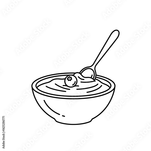 Greek yogurt in a bowl with spoon and berry topping  