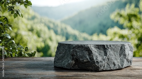 Stone podium on rock platform grey rock pedestal for a product display stand green forest and blurred on the background
