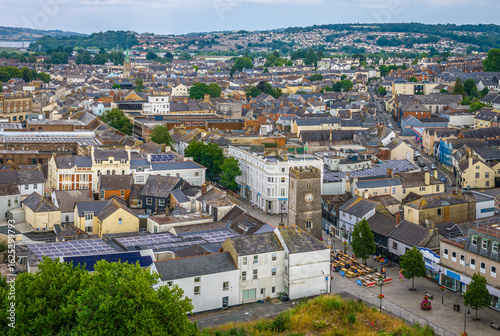 Aerial view of Newton Abbot’s historic St Leonard’s Tower (Clock Tower) rising above town centre pedestrian streets and shops