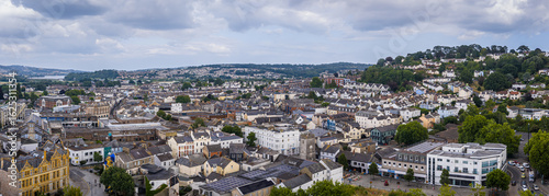 Aerial view of Newton Abbot’s historic St Leonard’s Tower (Clock Tower) rising above town centre pedestrian streets and shops