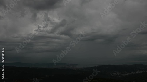 Time lapse of an approaching thunderstorm with lightning flash over the Gulf of Trieste, Italy