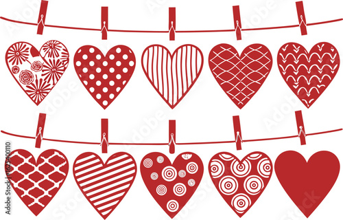 Red hearts with various patterns hanging on a clothesline