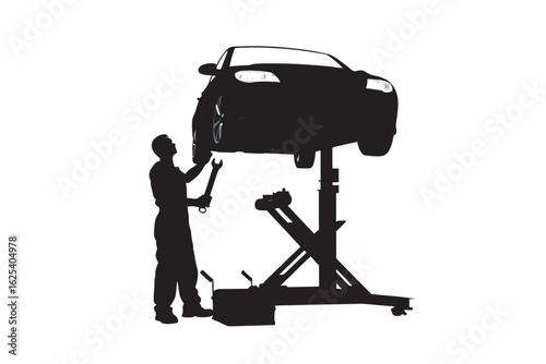 Silhouette of a mechanic working on a car lifted on a hydraulic car lift in a garage representing automotive repair and maintenance services
