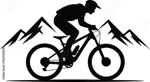 Dynamic mountain biker riding downhill with a rugged mountain range in the background silhouette