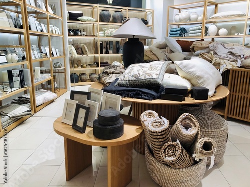 Alicante, Spain - August 02, 2025: Home decor display featuring textiles, decorative items, and accessories in Leroy Merlin store with copy space