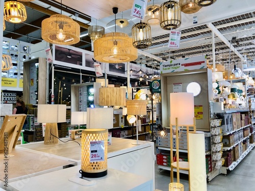 Alicante, Spain - August 02, 2025: Modern lighting display featuring various lamps and fixtures in Leroy Merlin store with copy space for design