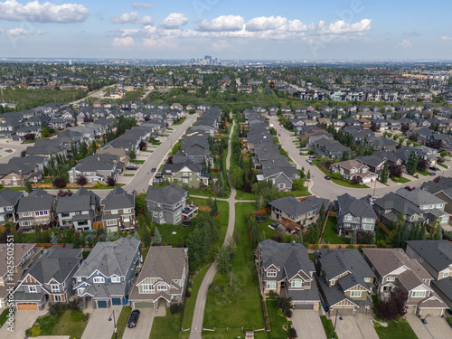 View of homes during the summer in Aspen Estates area of Calgary, Alberta.