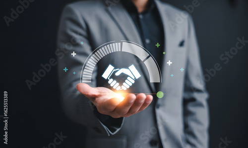 Business Partnership: An emblem of collaboration and deal-making hovers above the outstretched hand of a well-dressed professional, symbolizing a solid business alliance.