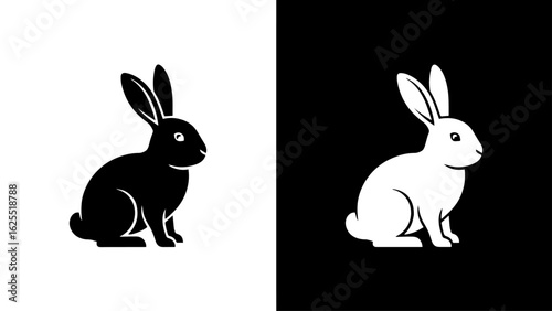 A serene black and white rabbit sits peacefully, showcasing a minimalist design against contrasting backgrounds.