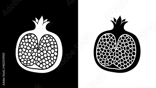 A halved pomegranate reveals its intricate seeds, a stark black and white contrast symbolizing duality and natural beauty.