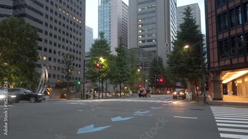 July 12, 2025. Chiyoda Ward, Tokyo. The buildings and office district of Marunouchi near Tokyo Station in the evening.