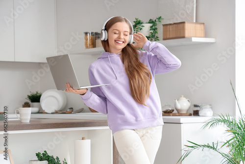 Young woman with headphones...