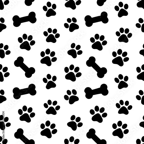 Seamless pattern of black dog paw prints and bone silhouettes isolated on transparent background