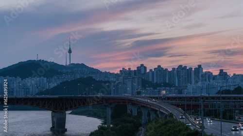 Day to night 4k timelapse in summer Seoul, South Korea, Namsan Tower, Dongho Bridge, and Han River cityscape
