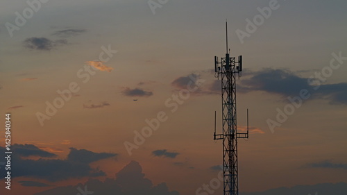 cell phone 5G  antenna tower sunset