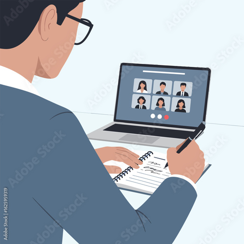 Person participating in a video conference call and taking notes.