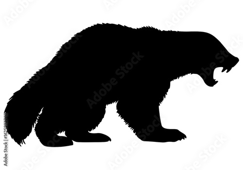 Vector Silhouette Of A Snarling Wolverine.