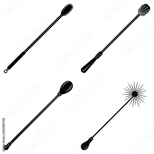 A collection of four different black and white stylized antique enema syringes in varying designs and shapes