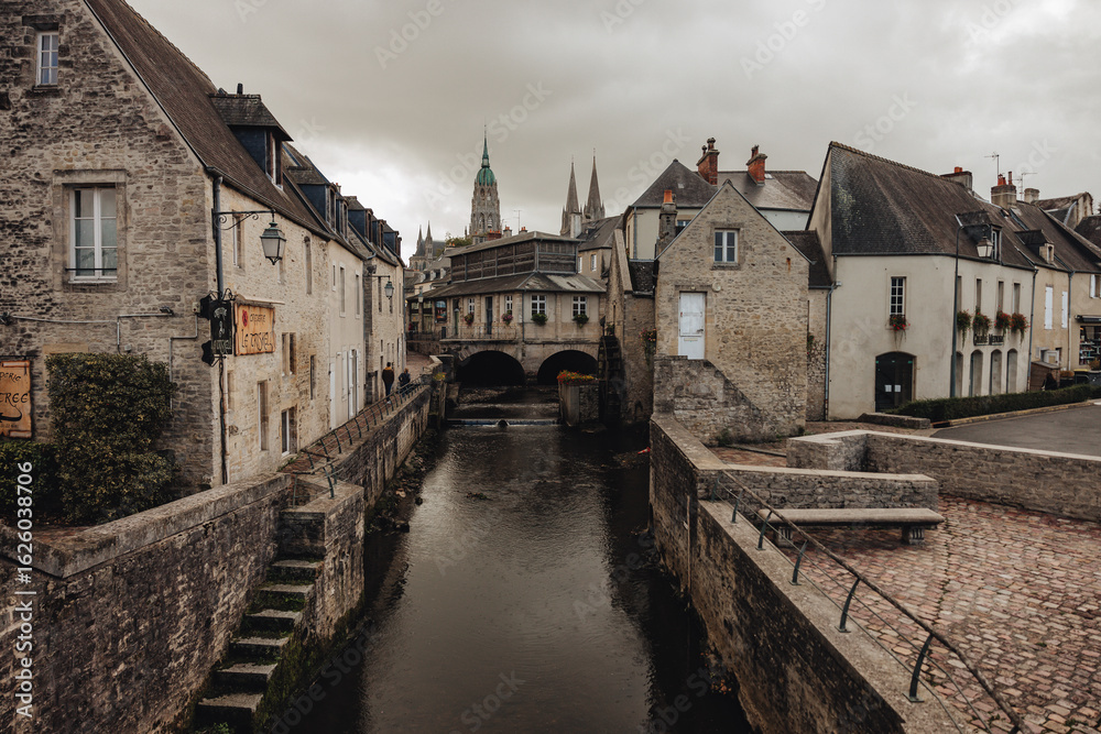 Obraz premium Historic Center of Bayeux with River Aure and Cathedral in Normandy, France