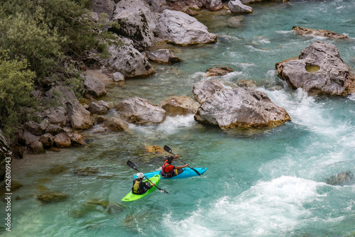 Bilde på lerret Kayaking in the summer on the Soca river, Slovenia