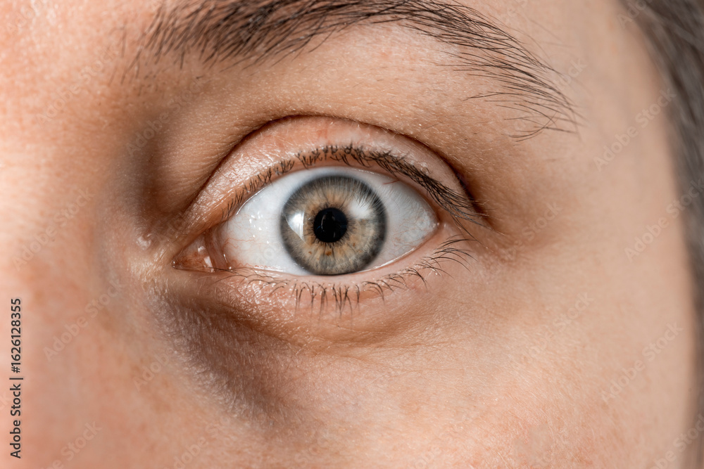 Fototapeta premium Scared human eye close up. Face without makeup