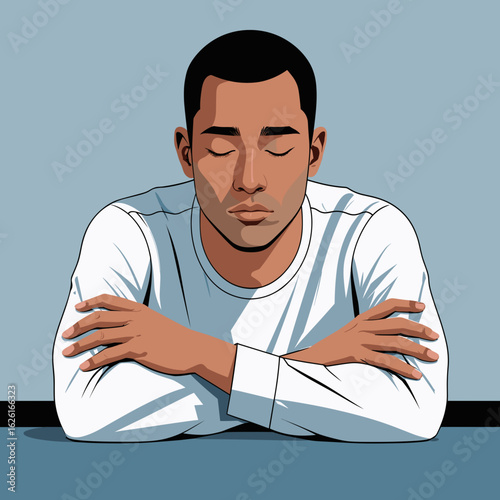 Young black man sitting with closed eyes and arms crossed at table  