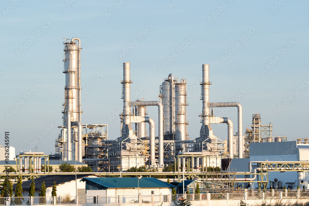 Petrochemical processing plant in Map Ta Phut Industrial Estate. To manufacturing gasoline fuel, power energy. Infrastructure for energy production. Concept of oil gas industry, power generation. Petrochemical processing plant in Map Ta Phut Industrial Estate. To manufacturing gasoline fuel, power energy. Infrastructure for energy production. Concept of oil gas industry, power generation.