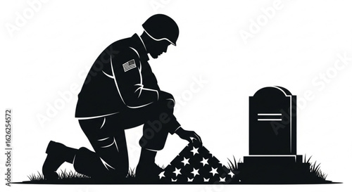 Silhouette of a soldier kneeling at a grave with an American flag in tribute