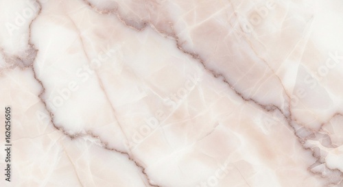 A detailed close-up of a polished light pink and white marble slab with soft, flowing brown and gray veins.