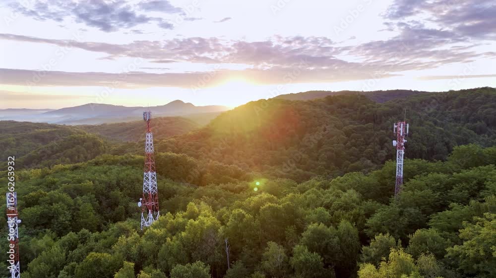 5G Cell towers at sunset in rural sky, showcasing mobile phone technology, radio, wireless and cellular communication