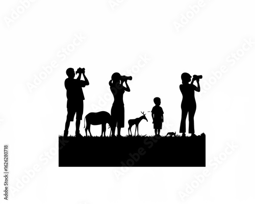 Family photographing wildlife on safari