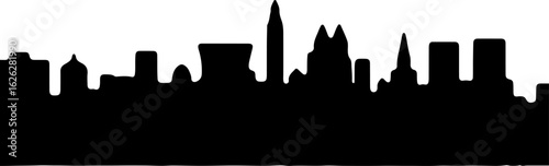 Black vector silhouette illustration of the New York City skyline with iconic skyscrapers at night