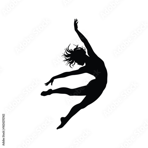 Silhouette of a female ballet dancer in a graceful leap
