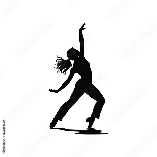Silhouette of a graceful female dancer in a dynamic pose