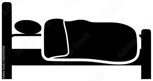 Bed in a luxurious hotel room with a beautiful wooden frame and soft blanket surrounded by pillows