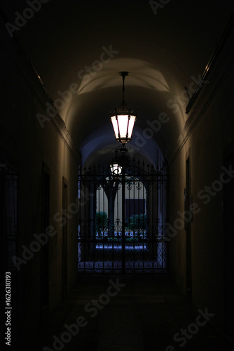 Arch with lanterns in an old Italian town