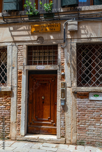 A photo of a building with a sign on the front of it