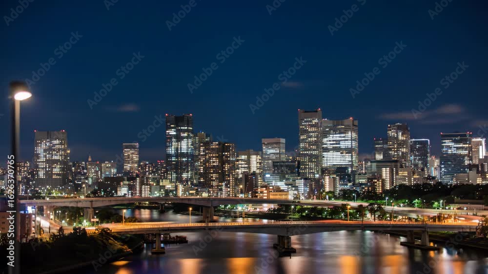 Stunning cityscape at night with blurred lights and vibrant reflections offering a dynamic urban background for travel videos and modern city life Stunning cityscape at night with blurred lights and vibrant reflections offering a dynamic urban background for travel videos and modern city life