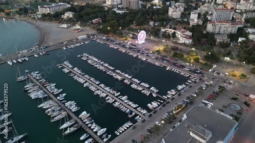 Seaside Promenade with Ferris Wheel and Marina at Twilight, Montenegro