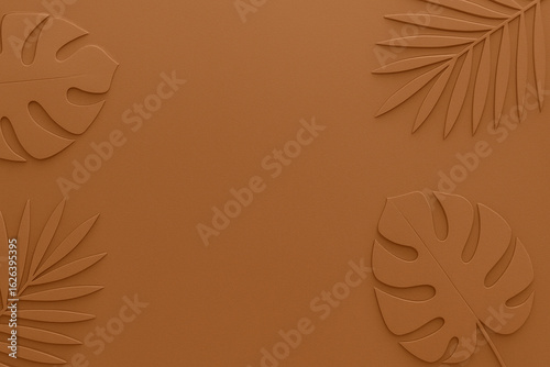 Paper-cut tropical leaves in various shapes and sizes arranged in the top left corner over a solid coffee color background.