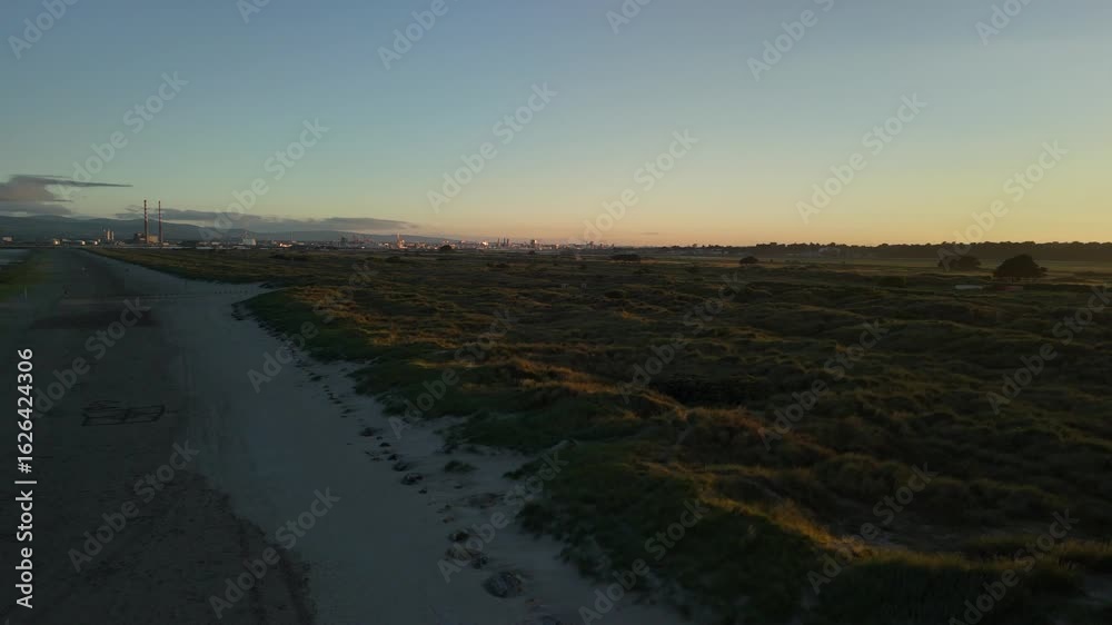 After-sunset flyover over Dollymount Strand Beach 4K, Ireland (1/2) After-sunset flyover over Dollymount Strand Beach 4K, Ireland (1/2)